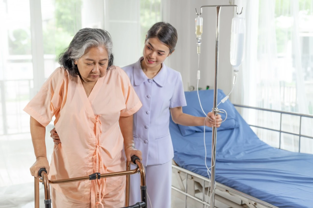 Caregiver providing Parkinson care at home